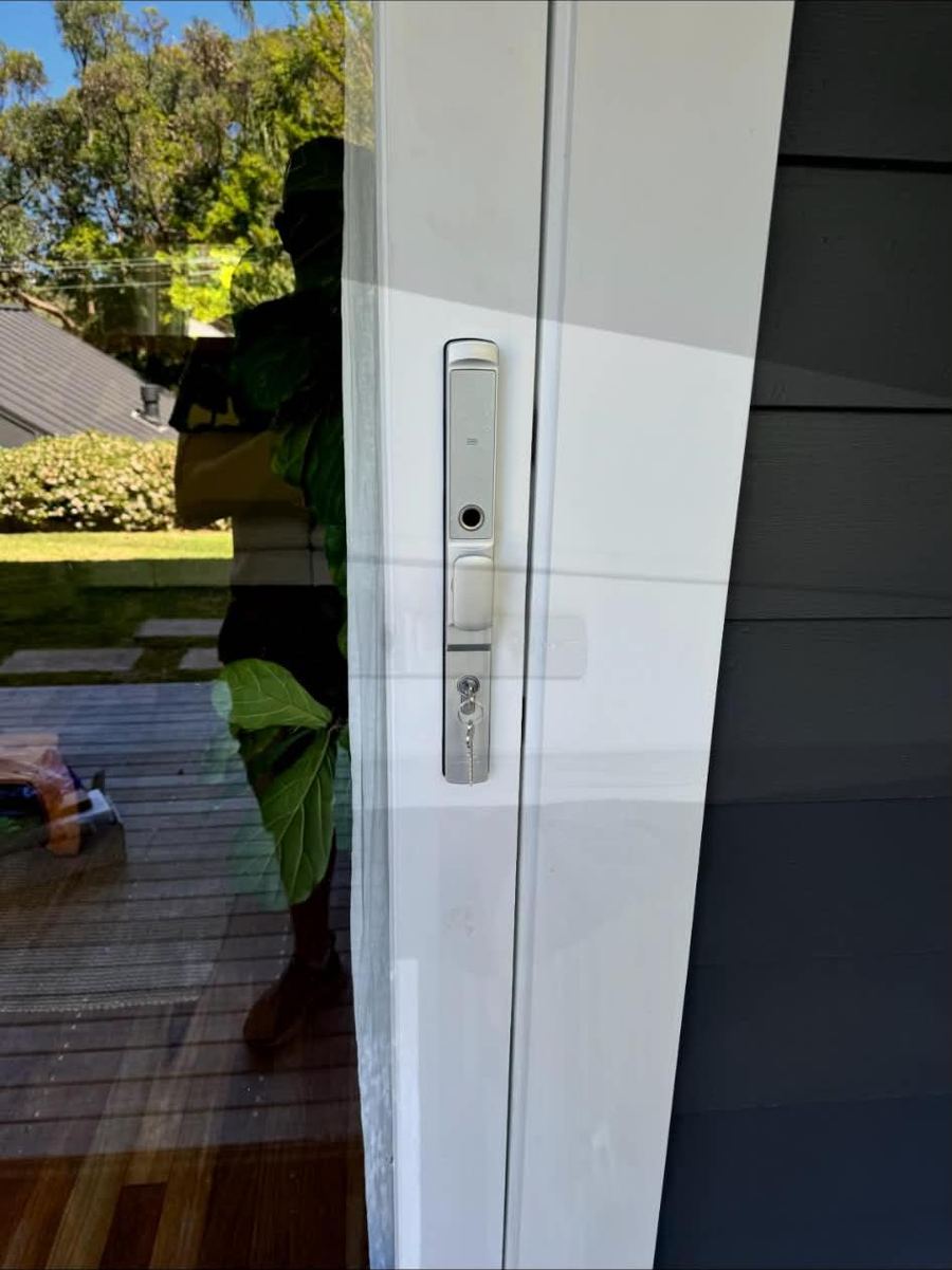 Lock installed on a sliding door